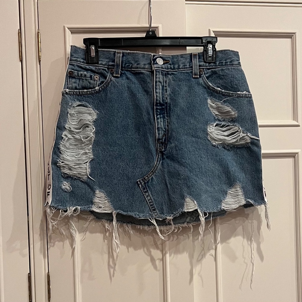NWOT: FIRST OF A KIND distressed denim mini skirt, Size 26